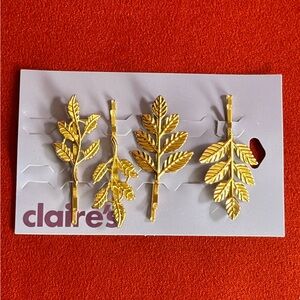 Claire’s gold tone hairpins, card of 4